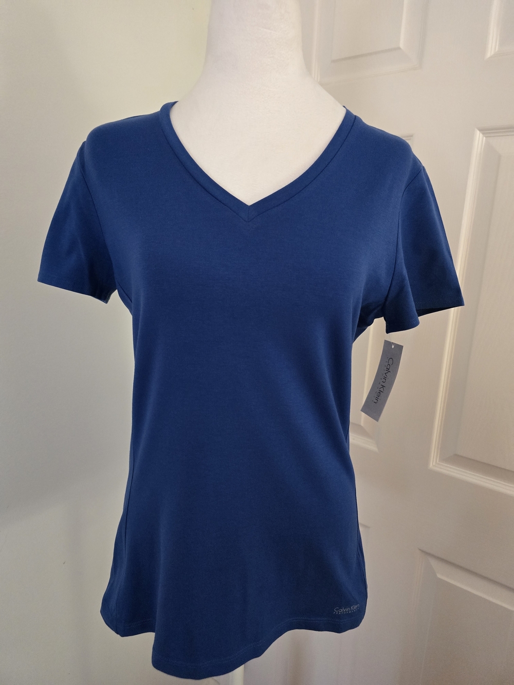 Calvin Klein Performance Women's Short Sleeve V-Neck Tee in Blue Sz. (Med)